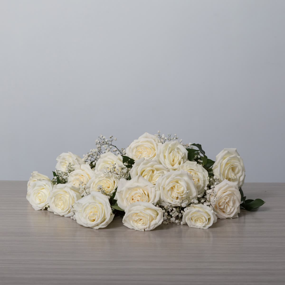 Playa Blanca Roses (18 roses, Arranged cut bouquet, With greenery and floral accents)