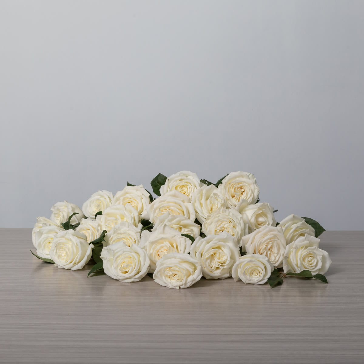 Playa Blanca Roses (24 roses, Arranged cut bouquet, With greenery)