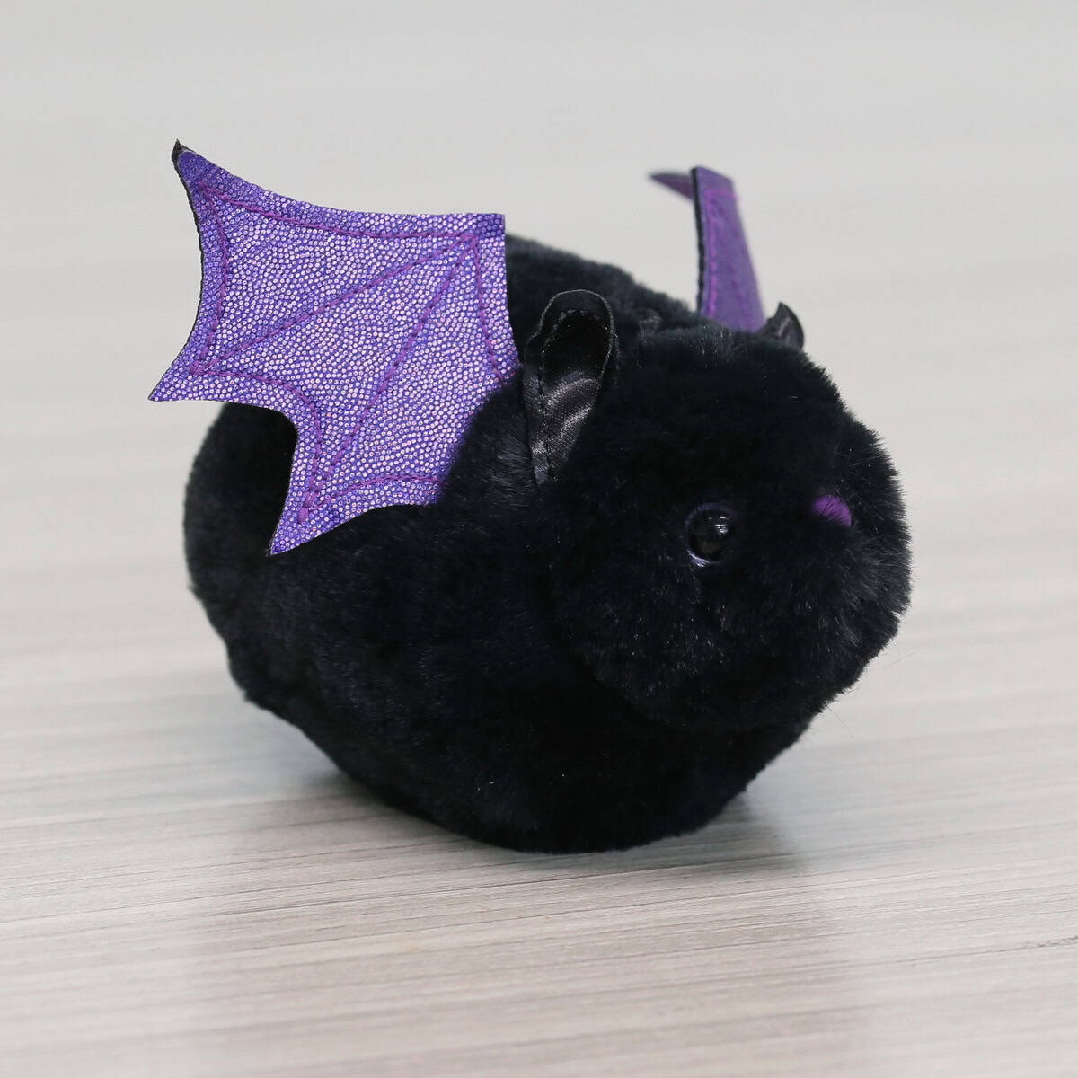 Black and Purple Bat