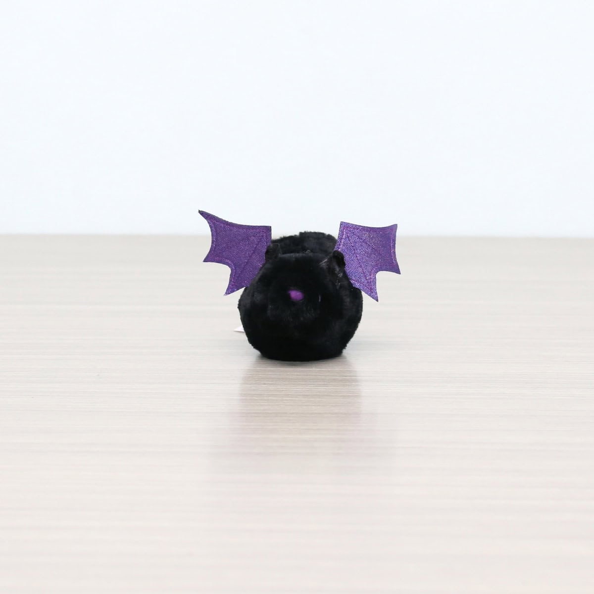 Black and Purple Bat
