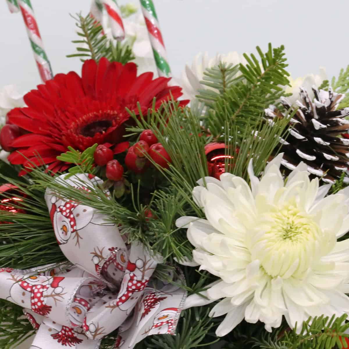 Holiday Sleigh Surprise – Christmas Floral Arrangement