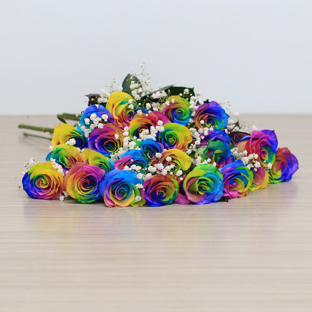 rainbow roses arranged bouquet